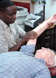 Patient receives chiropractor treatment at Wylie Northeast Rehab near Sachse, Murphy, Lavon, and Garland